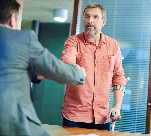 Car-accident-survivor-shaking-the-hand-of-a-personal-injury-attorney Car-accident-survivor-shaking-the-hand-of-a-personal-injury-attorney