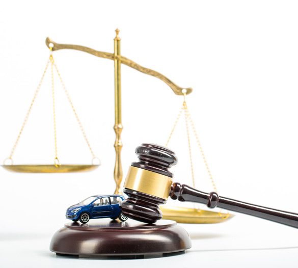 Model-car-and-gavel-on-a-white-background Model-car-and-gavel-on-a-white-background