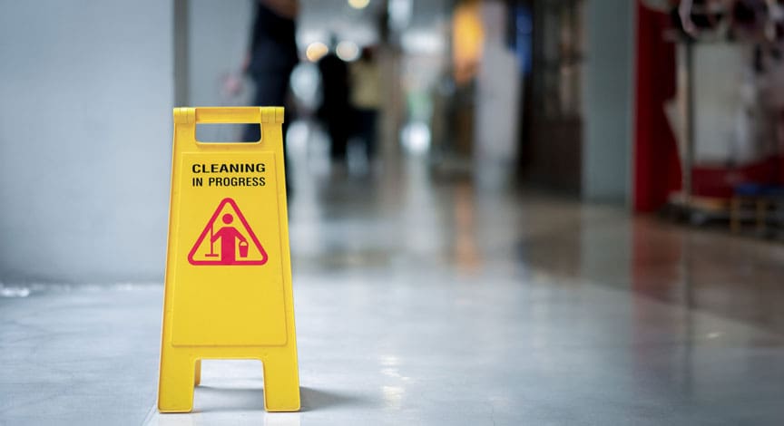 yellow-caution-wet-floor-sign-on-a-store-floor.